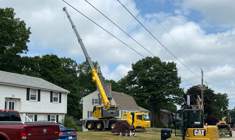 Tree Removal using our 100 ton crane in Billerica, MA