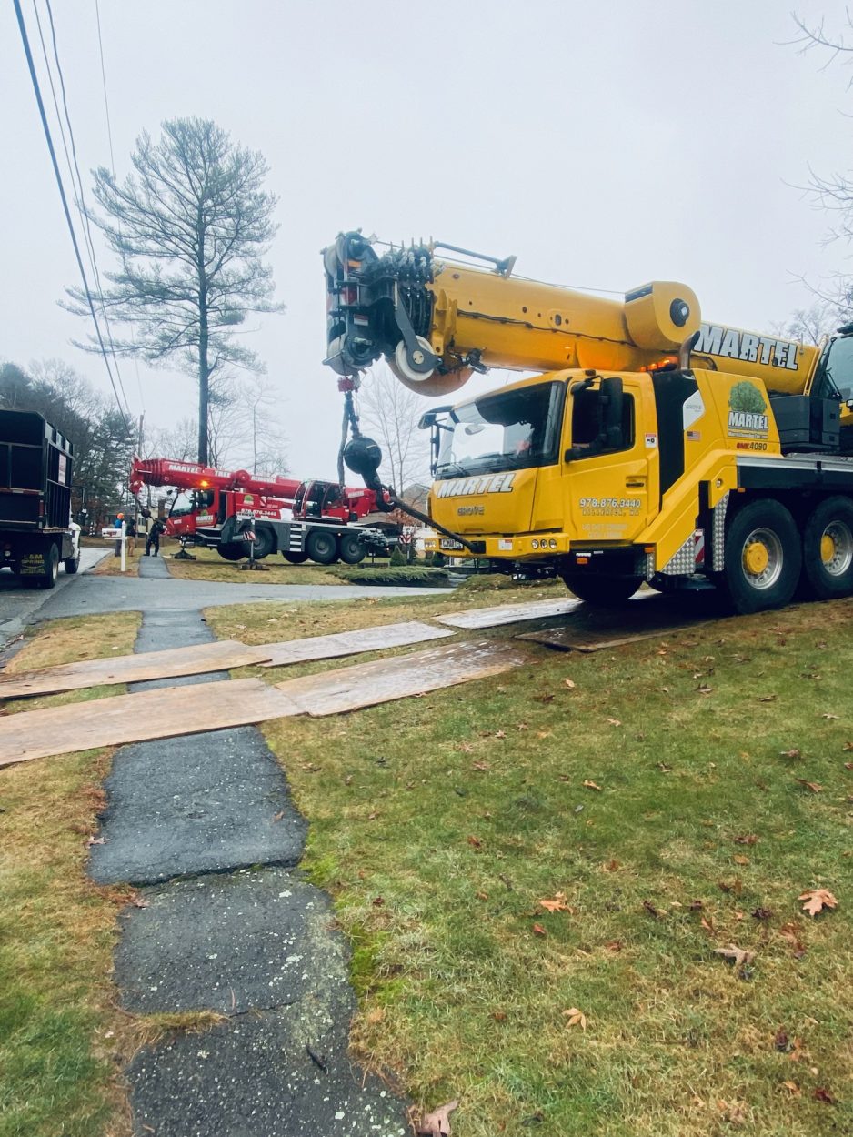 The crew from Martel Crane and Tree needed two cranes to remove multiple trees from this residence in Billerica, MA.
