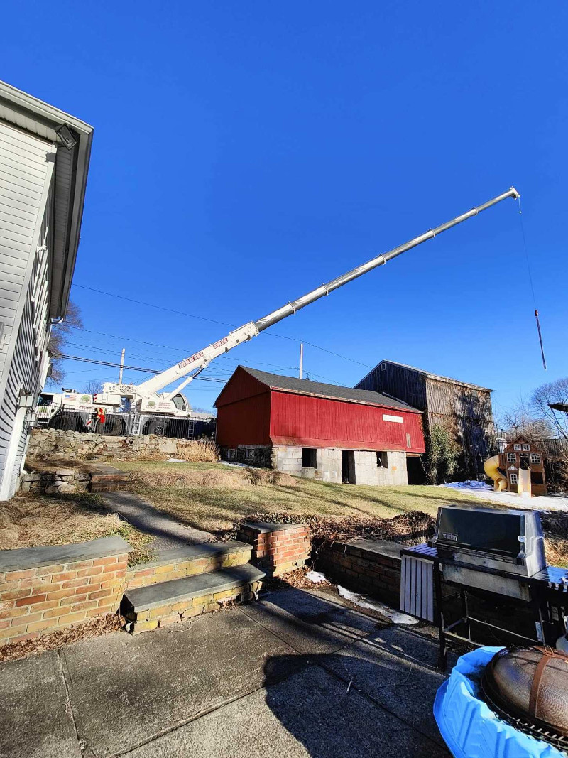 Martel Crane & Tree Service used one of our cranes to safely remove large pines from this residence in Billerica, MA.

