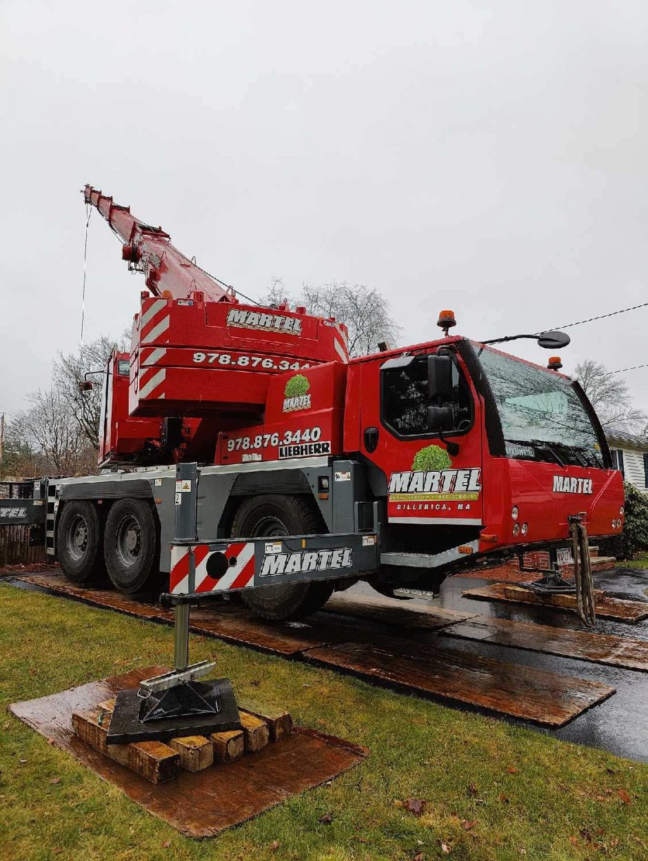 Martel Crane and Tree removed trees from this residential property in Tewksbury, MA.
