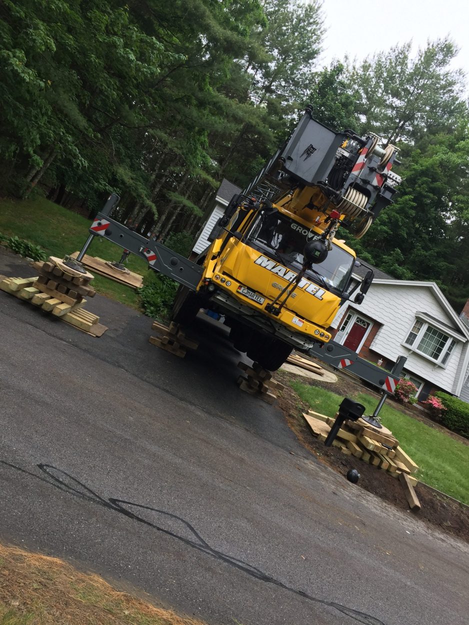 Tree Removal using the crane in Billerica, MA.